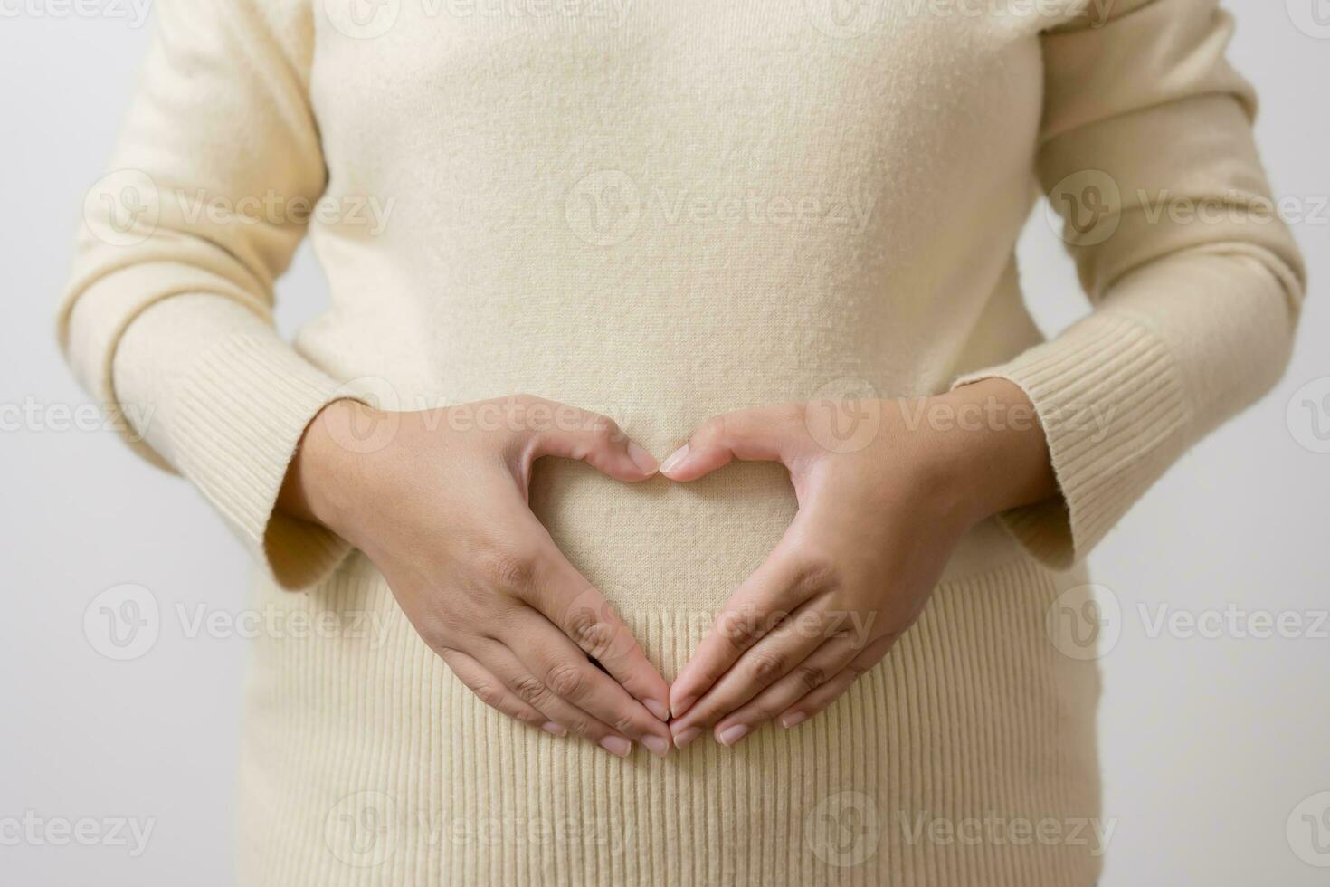 An obesity using measuring tape to show the real size. Chubby fat woman using measure tape at belly. Real size woman after gave birth to baby, real skin with wrinkles and scars. photo