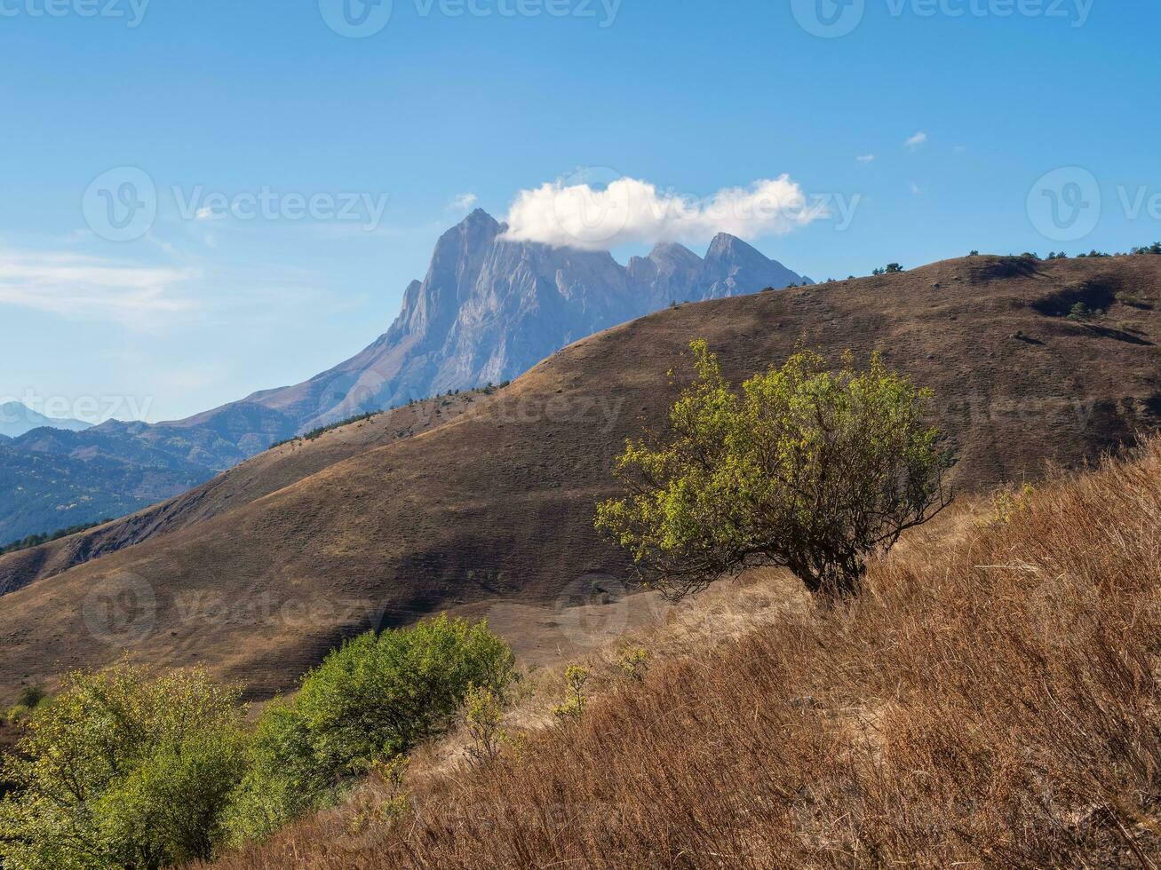 Tsey-Loam Mountain, Ingushetia. Autumn mountain landscape with pointed rocks on a clear sunny day. Autumn mountain landscape of Ingushetia. photo