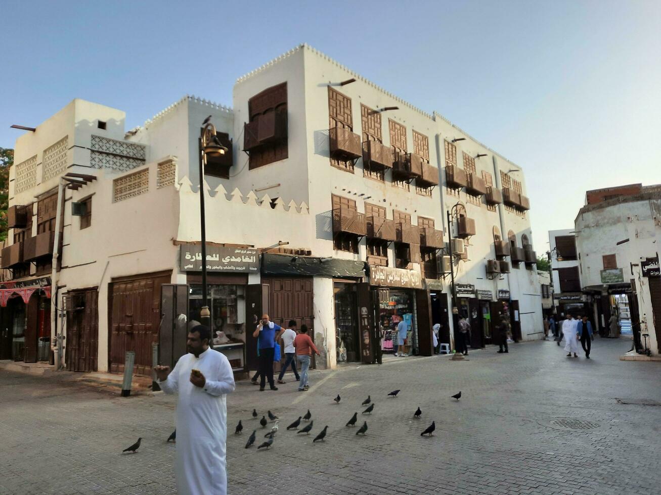 Jeddah, Saudi Arabia, April 2023 - A view of the old and historical part of the city of Jeddah, Saudi Arabia.  These buildings are located in Balad area of Jeddah. photo