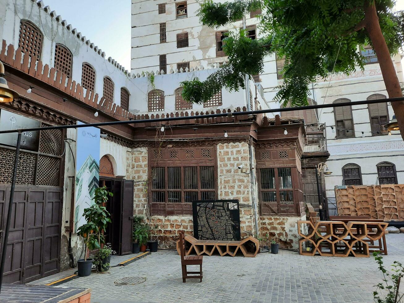 Jeddah, Saudi Arabia, April 2023 - A view of the old and historical part of the city of Jeddah, Saudi Arabia.  These buildings are located in Balad area of Jeddah. photo