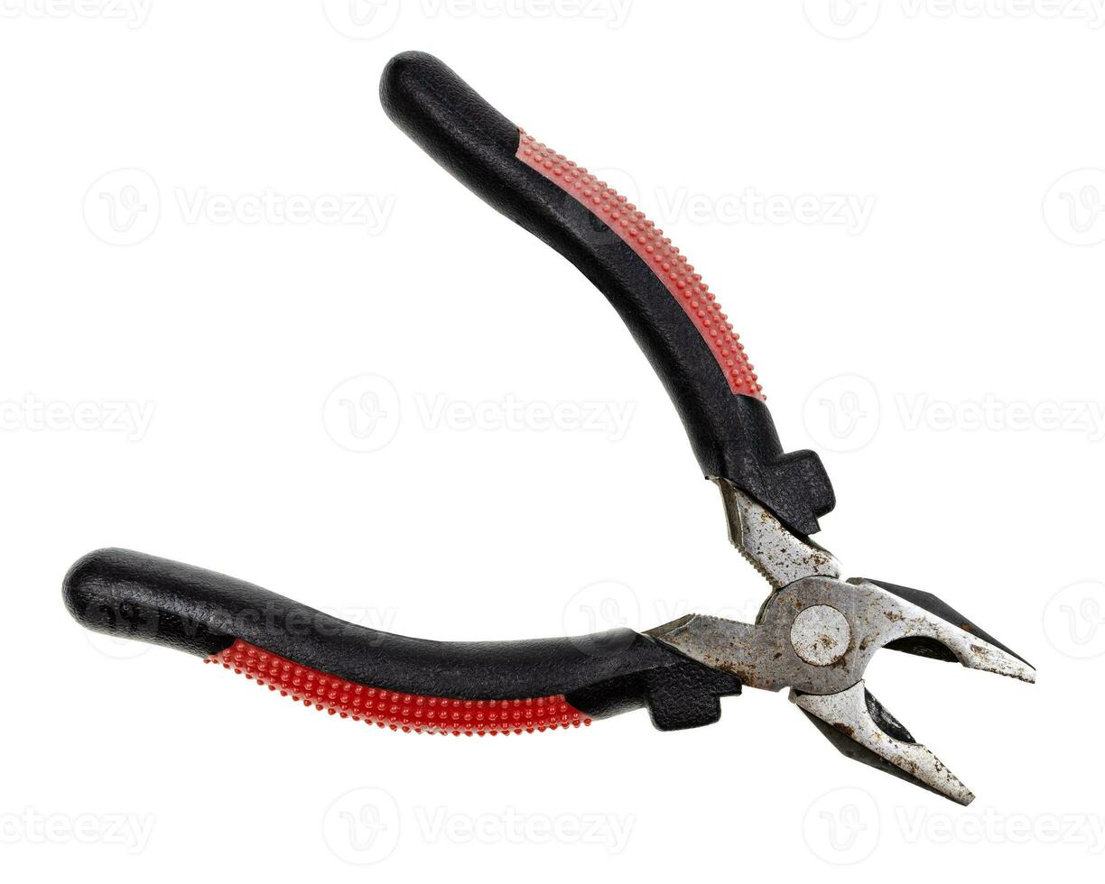 open old pliers with red and black rubber handle photo