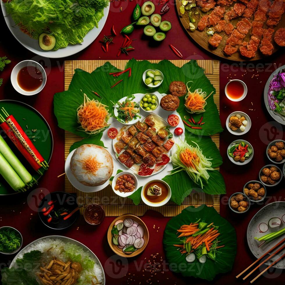 Top view of table dinner Vietnamese. Knolling photography of family dinner new year , vibrant. Vietnamese Traditional Meal in Country side. Flat lay. photo