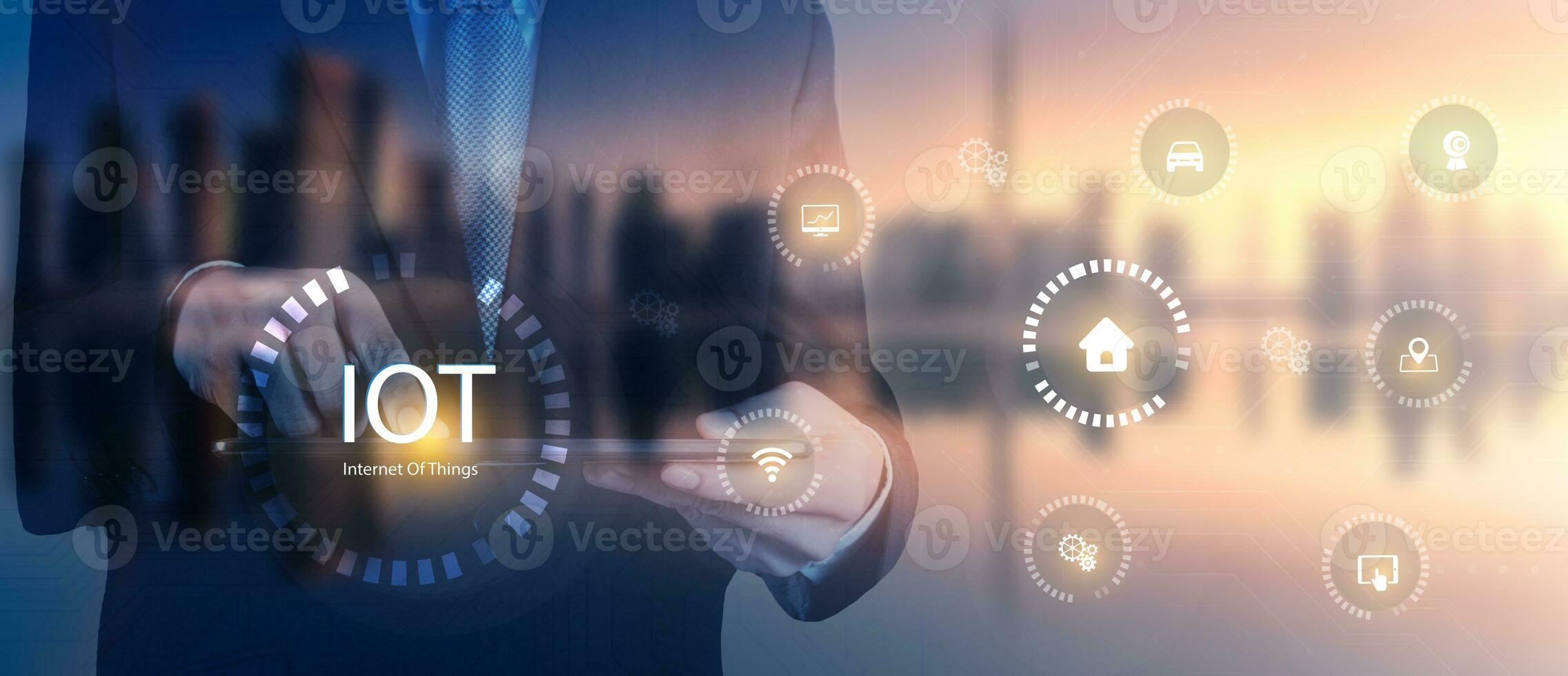 Businessman touching on tablet IOT icon concept design. Symbol IOT connected with icons of typical on dark .Internet of things user connecting interconnecting with everyday objects with network. photo