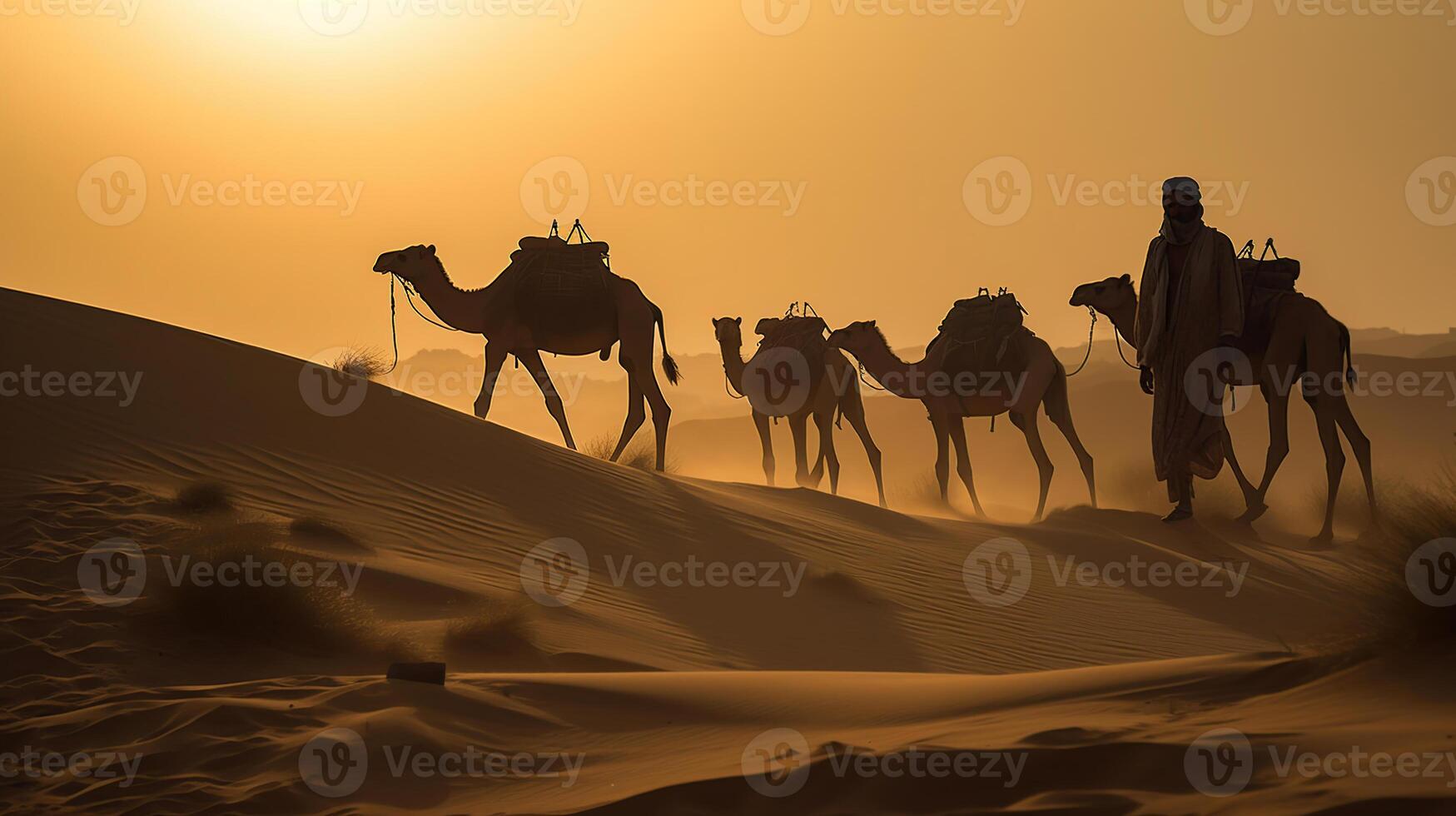 Indian cameleers bedouin with camel silhouettes in sand dunes of Thar desert on sunset. photo