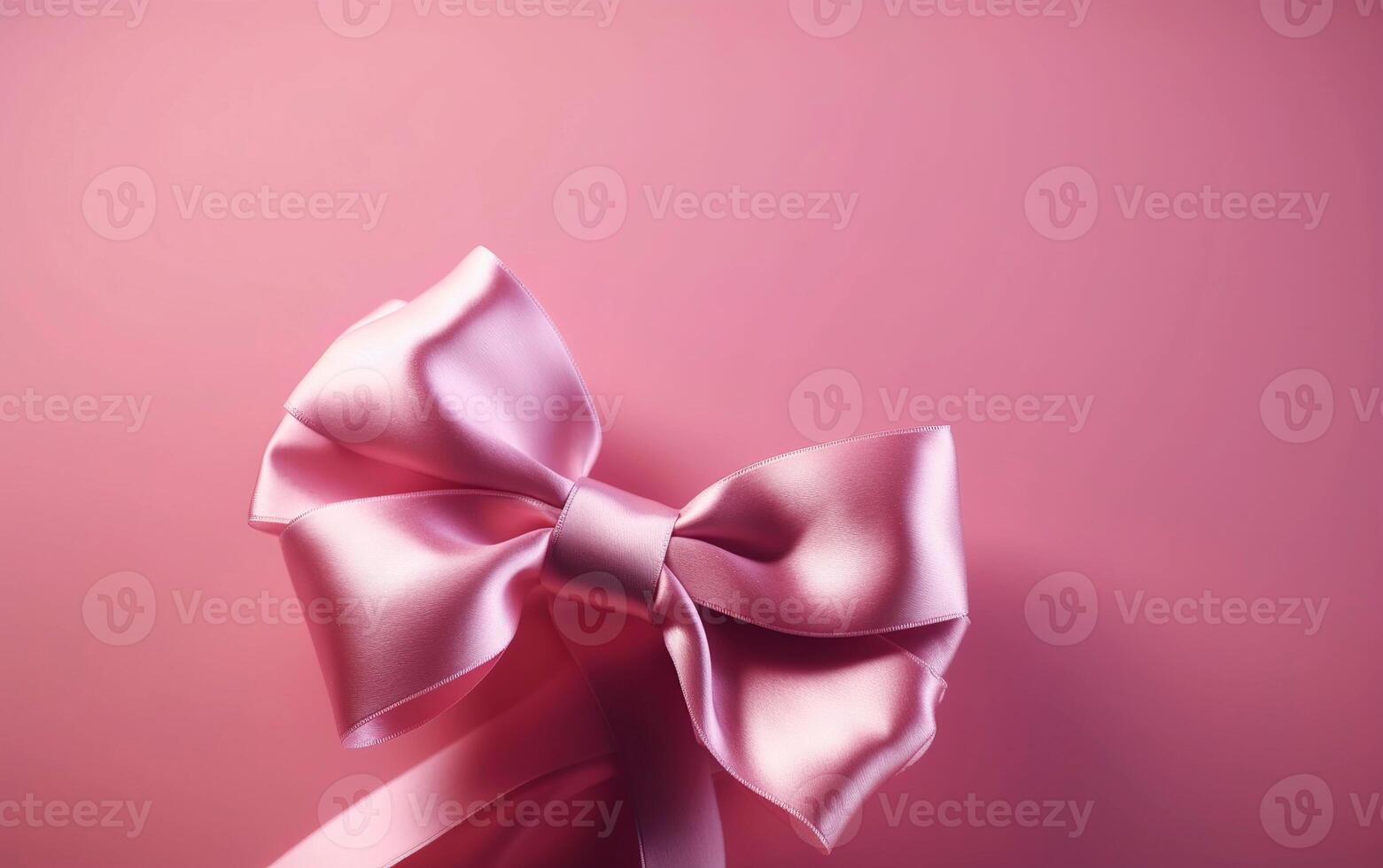 Pink bow over pink background. Happy Mothers Day. Womans day. . photo