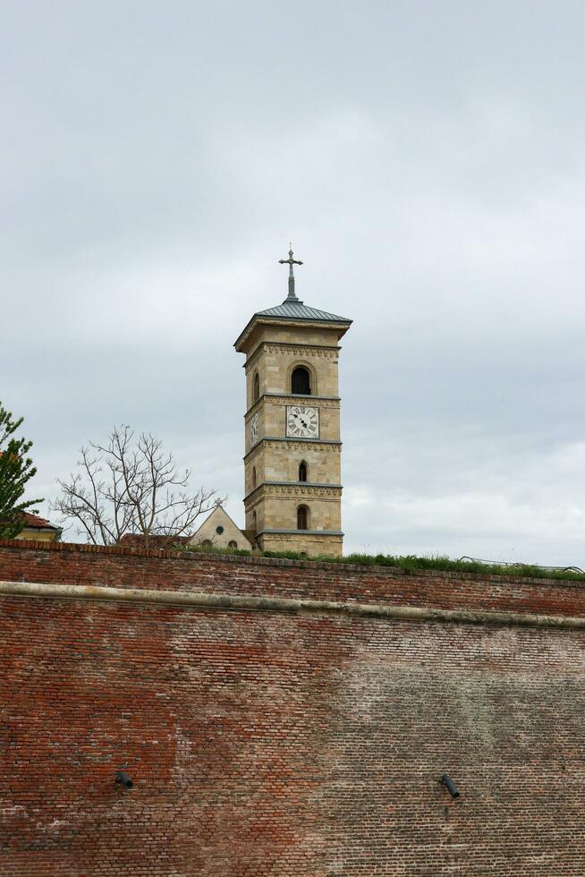 Saint Michael's Roman Catholic Cathedral in Alba Iulia immortalized from different angles photo