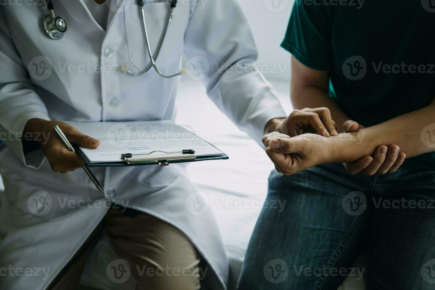 Doctor telling to patient woman the results of her medical tests. Doctor showing medical records to cancer patient in hospital ward. Senior doctor explaint the side effects of the intervention. photo