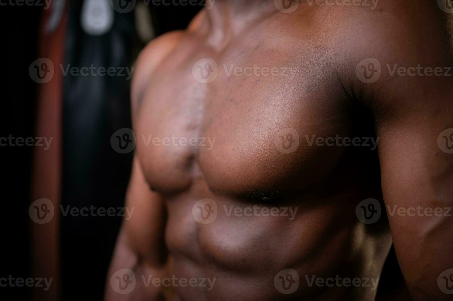 Muscular abs of foreign boxers, Muay Thai, Is a Thai martial art of using weapons from the body such as fists, feet, knees, elbows. photo