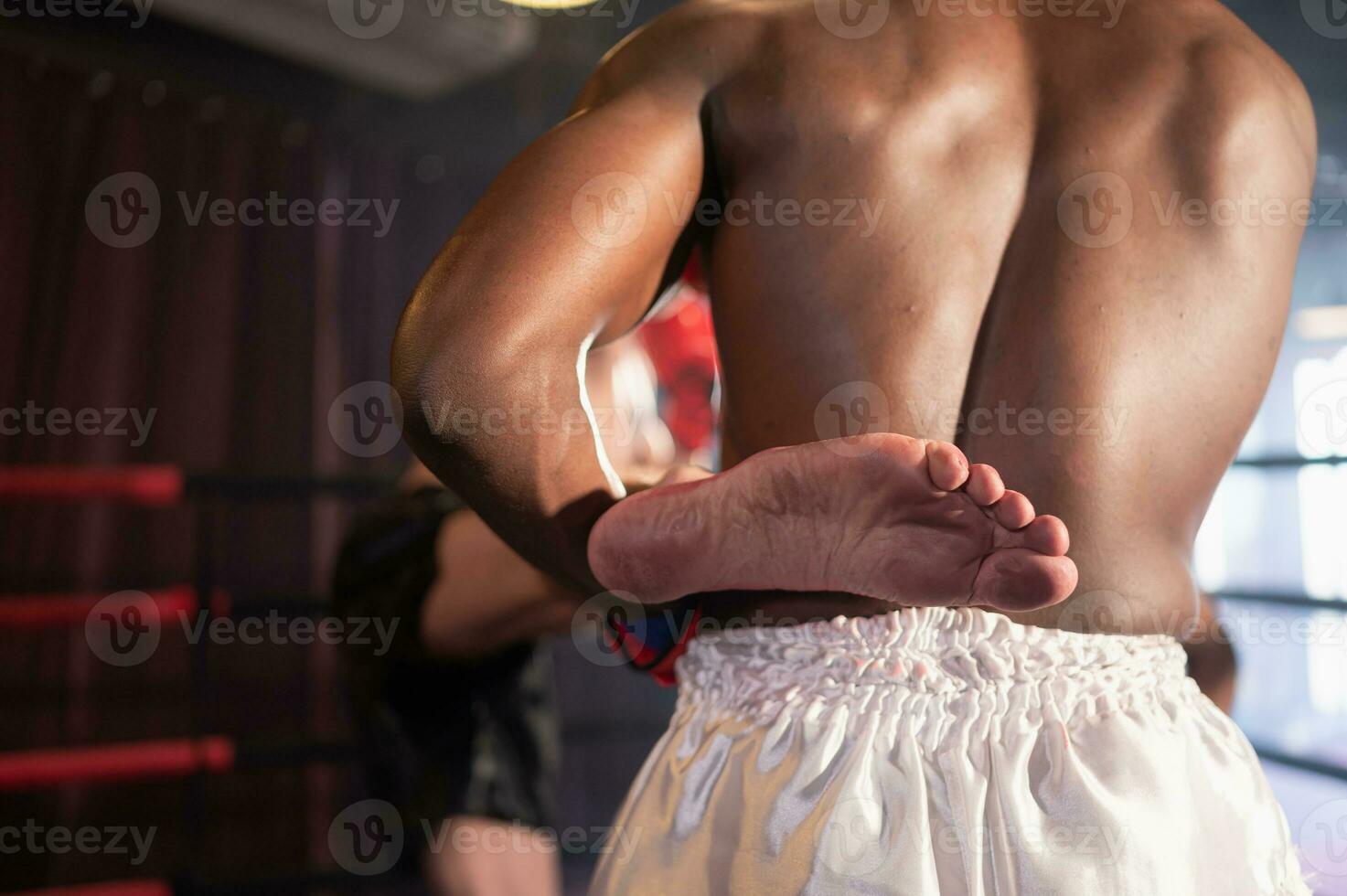 Using the feet is one of the master techniques of Muay Thai that is used to kick and lift to prevent kicks. which boxers are popularly used as weapons, Muay Thai,Thai martial arts. photo