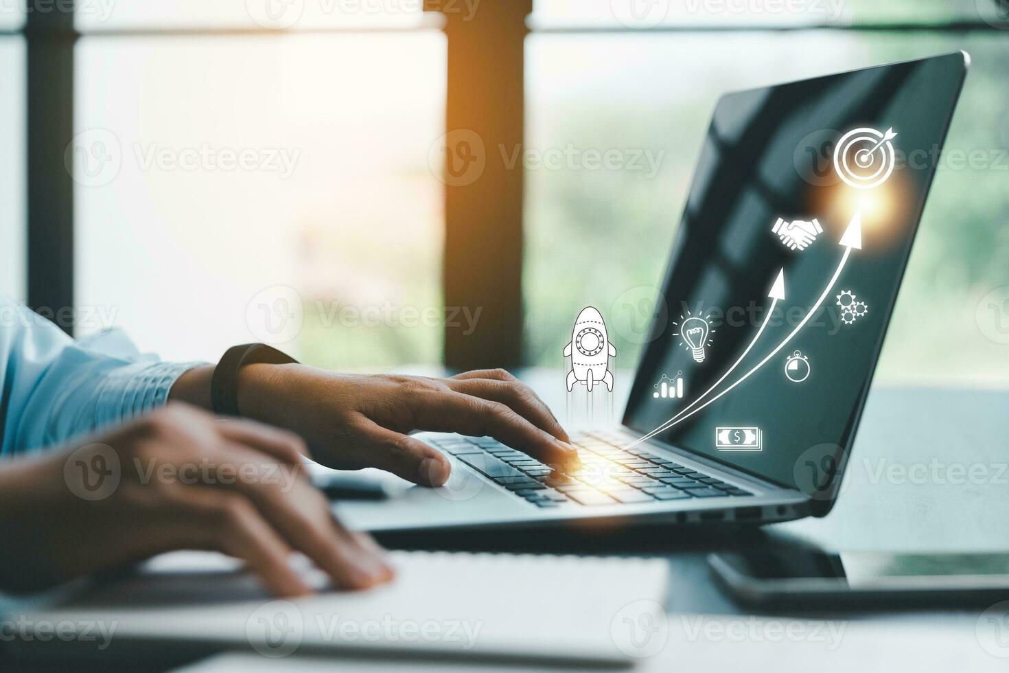 Startup concept with icon business and network connection on modern virtual interface from laptop computer. People hand touching on tablet.Developing and improving organization with modern technology photo