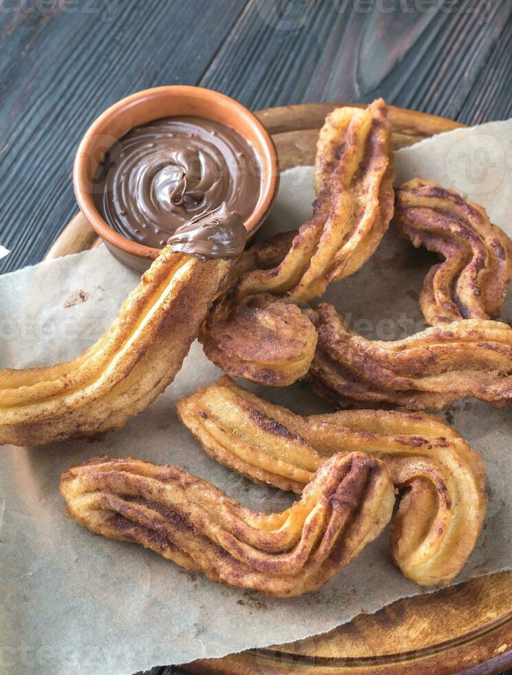 churros con salsa de chocolate foto