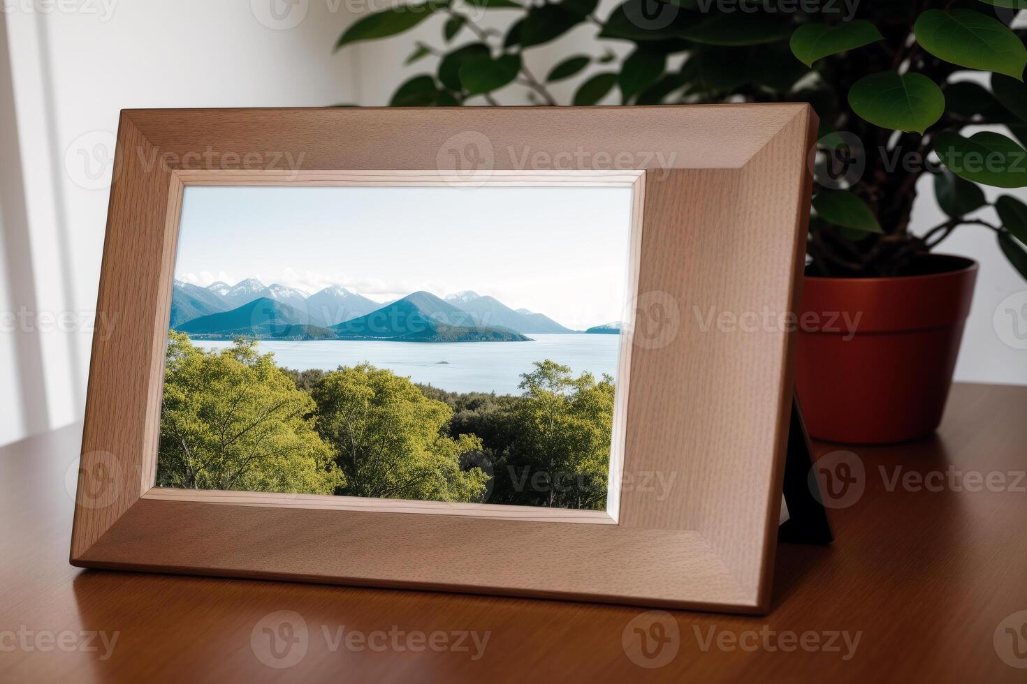 Photo frame on the wooden table. Blank wooden photo frame. Mock up.