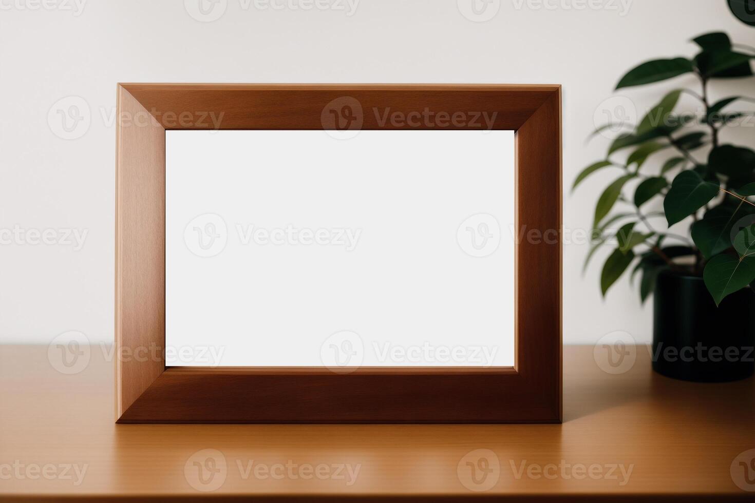 Photo frame on the wooden table. Blank wooden photo frame. Mock up.