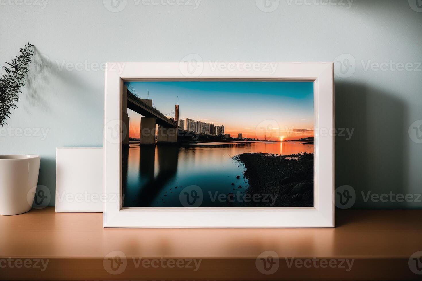 Photo frame on the wooden table. Blank wooden photo frame. Mock up.