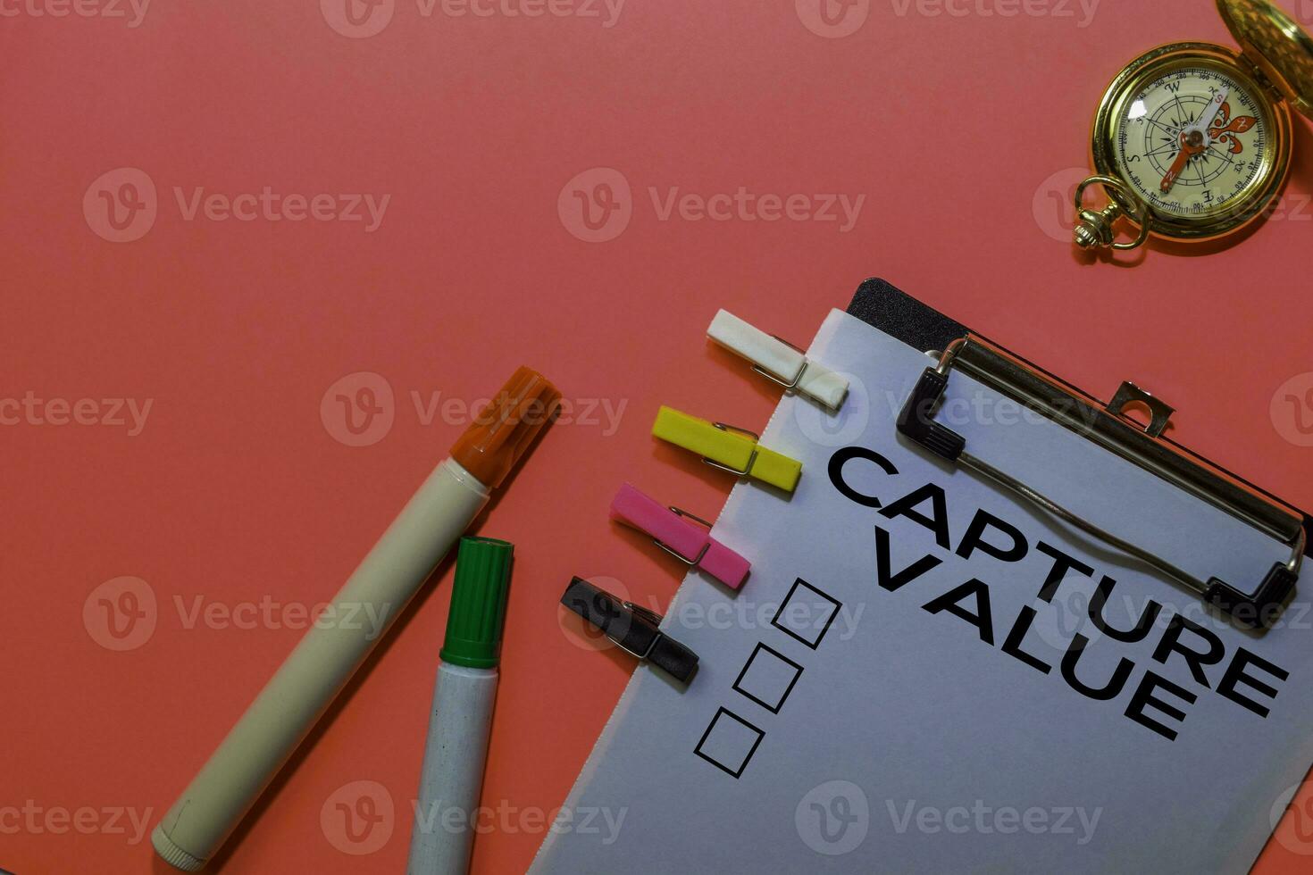 Capture Value write on Documents isolated on Pink background. photo