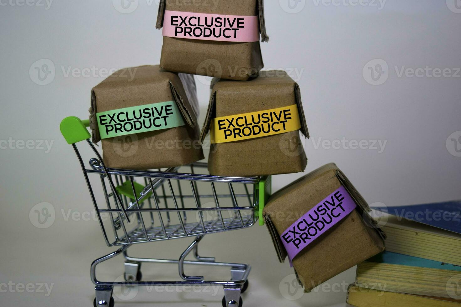 Exclusive Product Text in small boxes and shopping cart. Concepts about online shopping. Isolated on white background photo