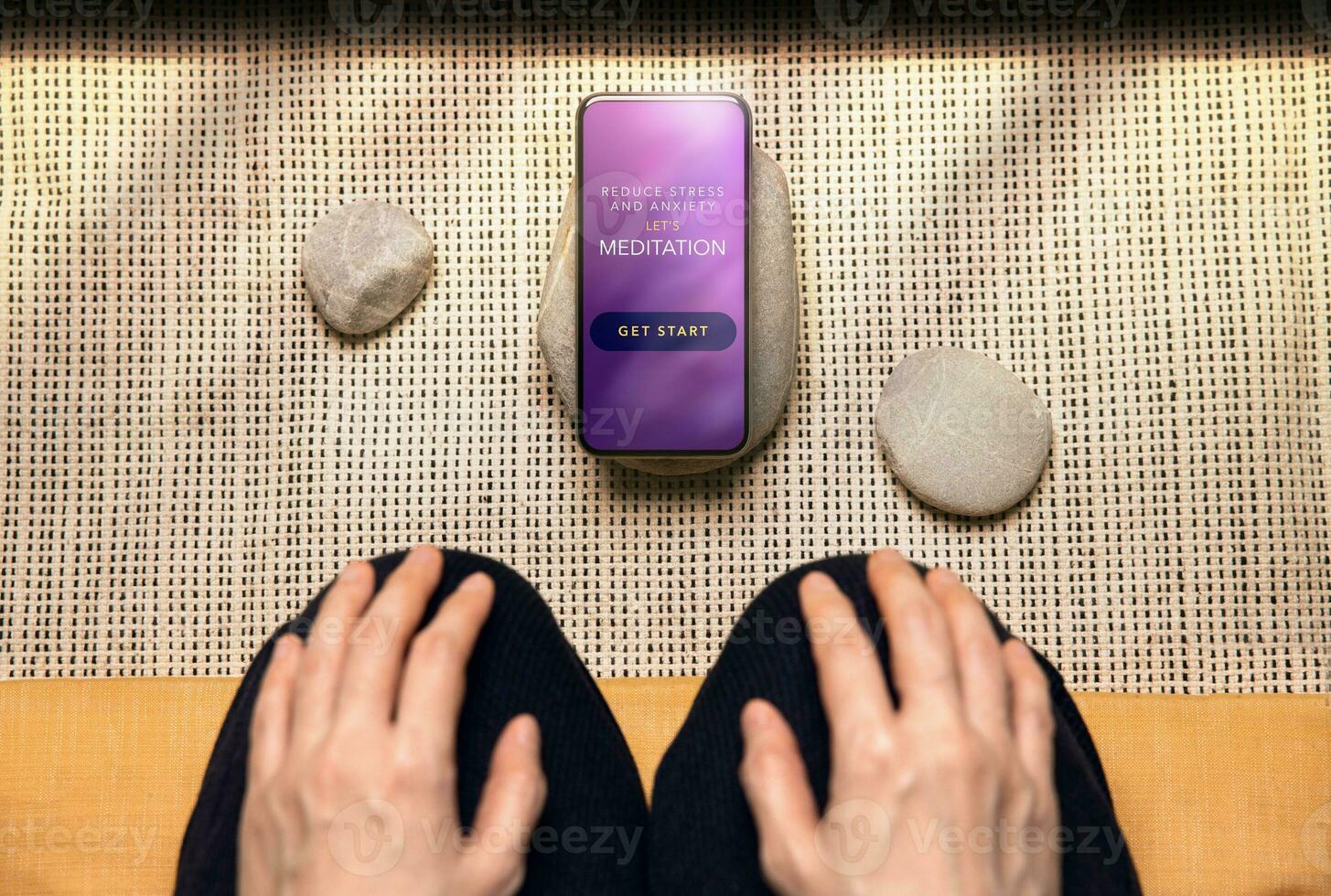 Mental Health Concept. Person Using Tech to Healing and Practicing Mind. Self Care and Soothing Life. Meditation App show on Mobile Phone. Scene as Zen. Top View photo