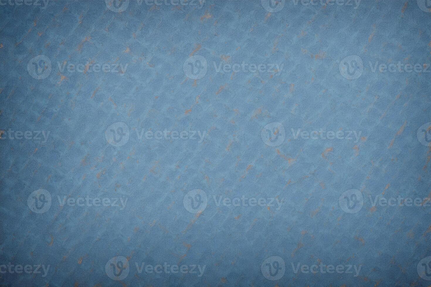 Grunge blue background with space for your text or image. Blue jeans background. photo