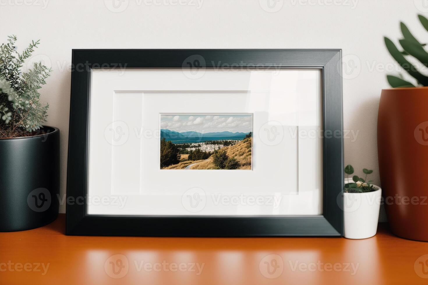 Photo frame on the wooden table. Blank wooden photo frame. Mock up.