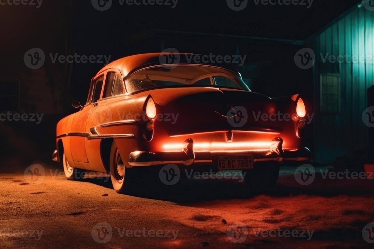 Illuminated retro classic car at night. photo