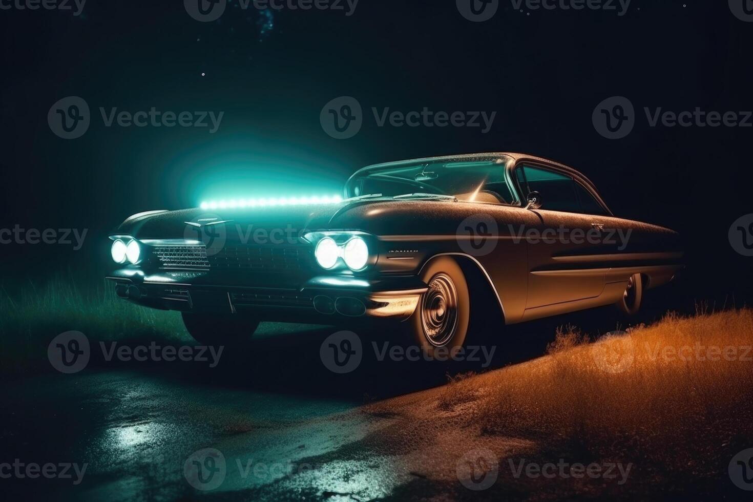 Illuminated retro classic car at night. photo