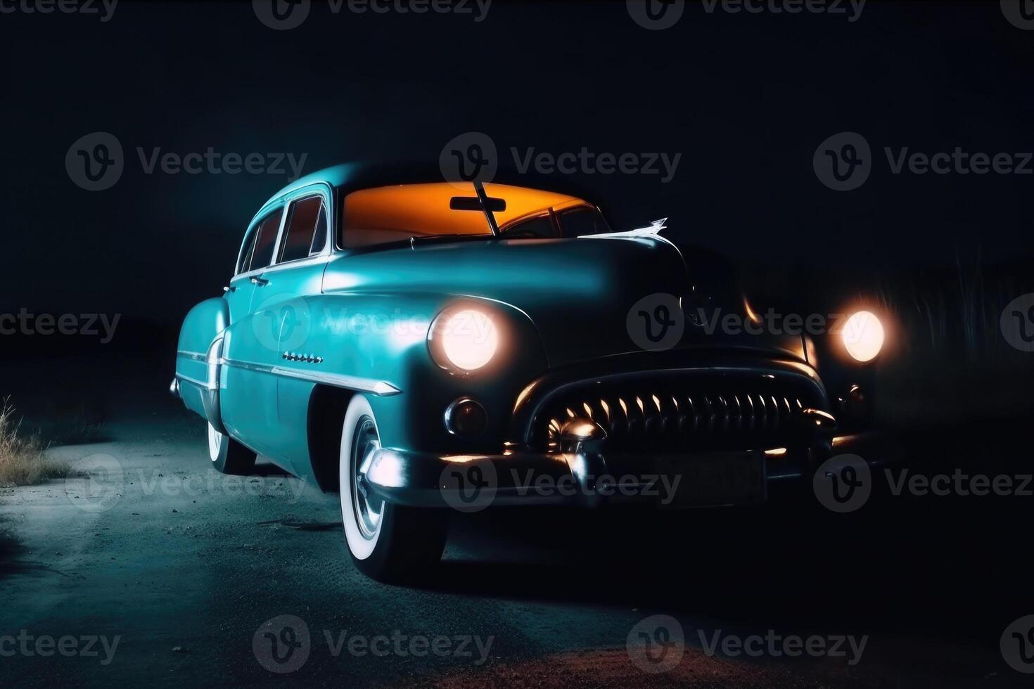Illuminated retro classic car at night. photo
