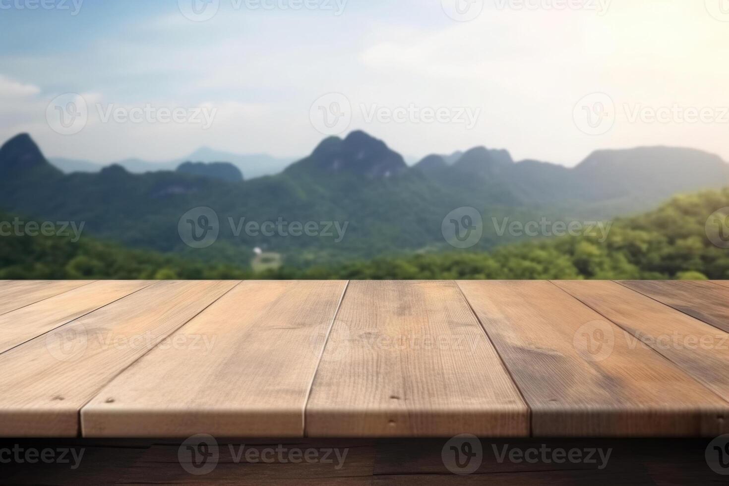 Empty wooden table with blurred mountain landscape background. photo