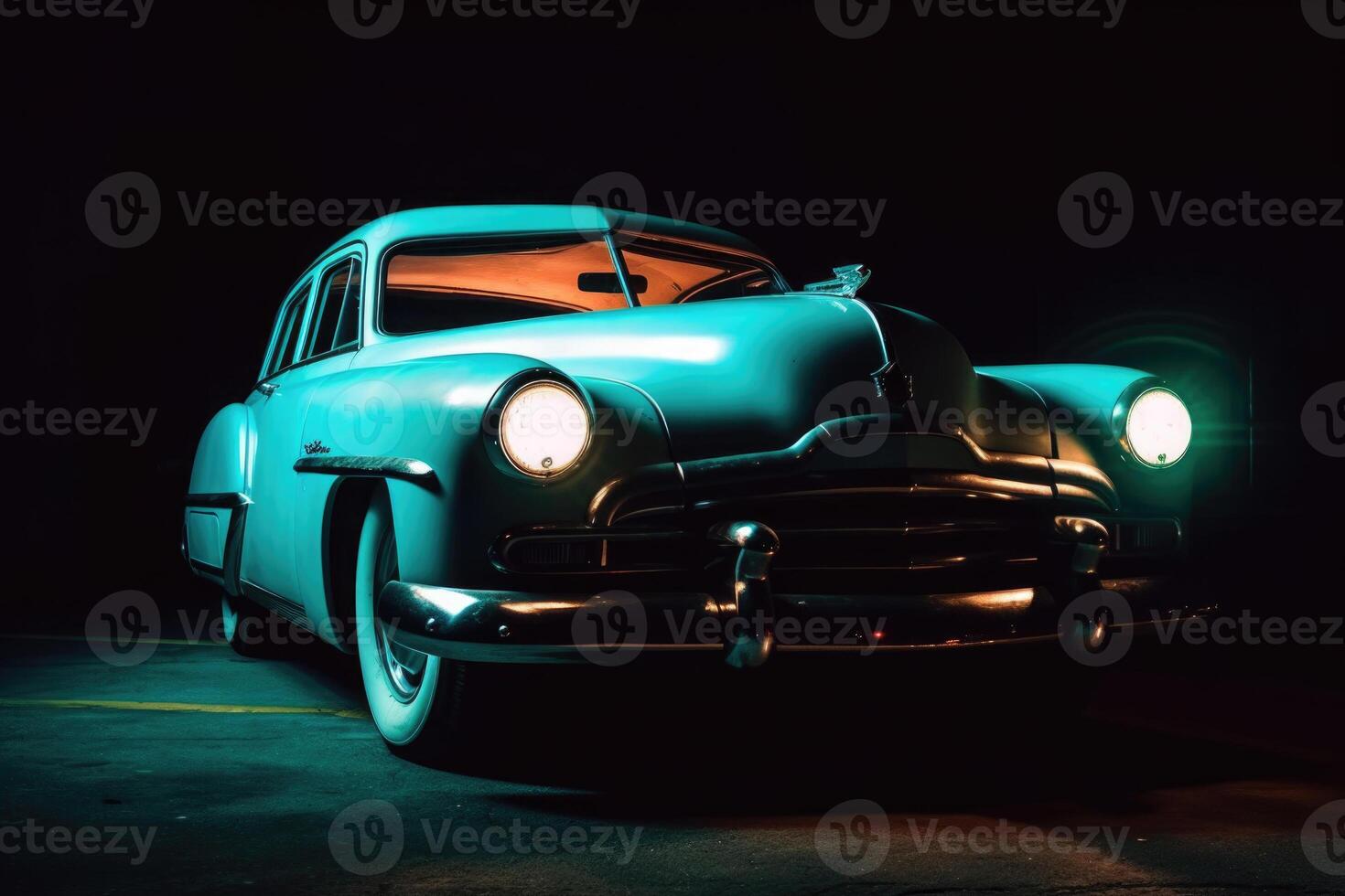 Illuminated retro classic car at night. photo