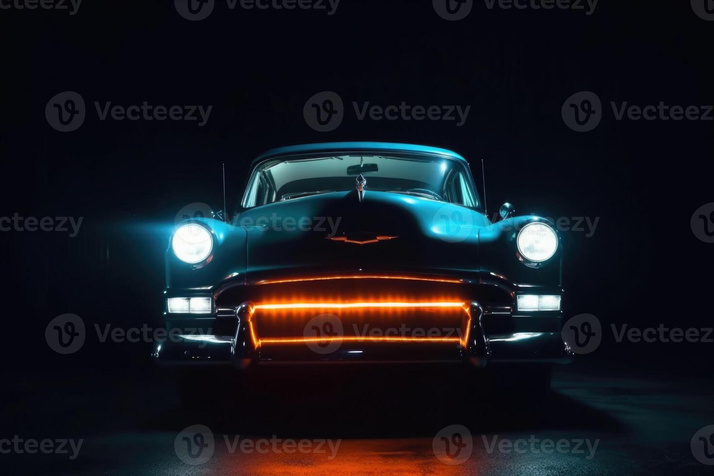 Illuminated retro classic car at night. photo