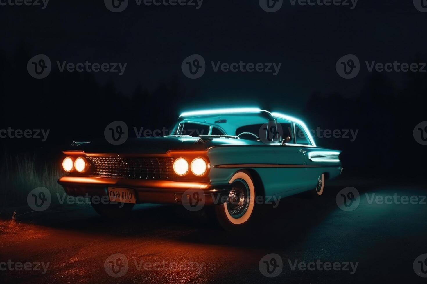 Illuminated retro classic car at night. photo