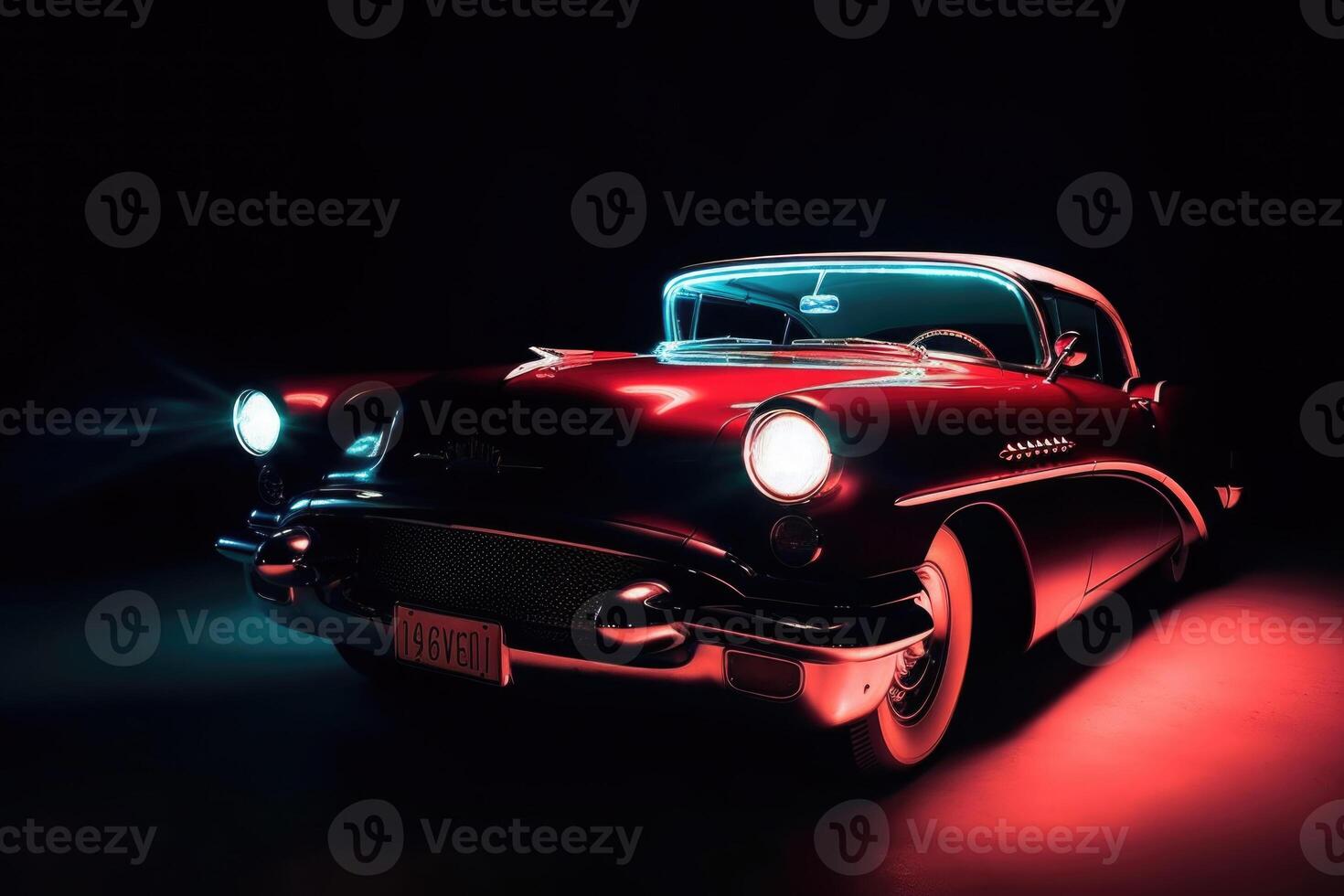 Illuminated retro classic car at night. photo