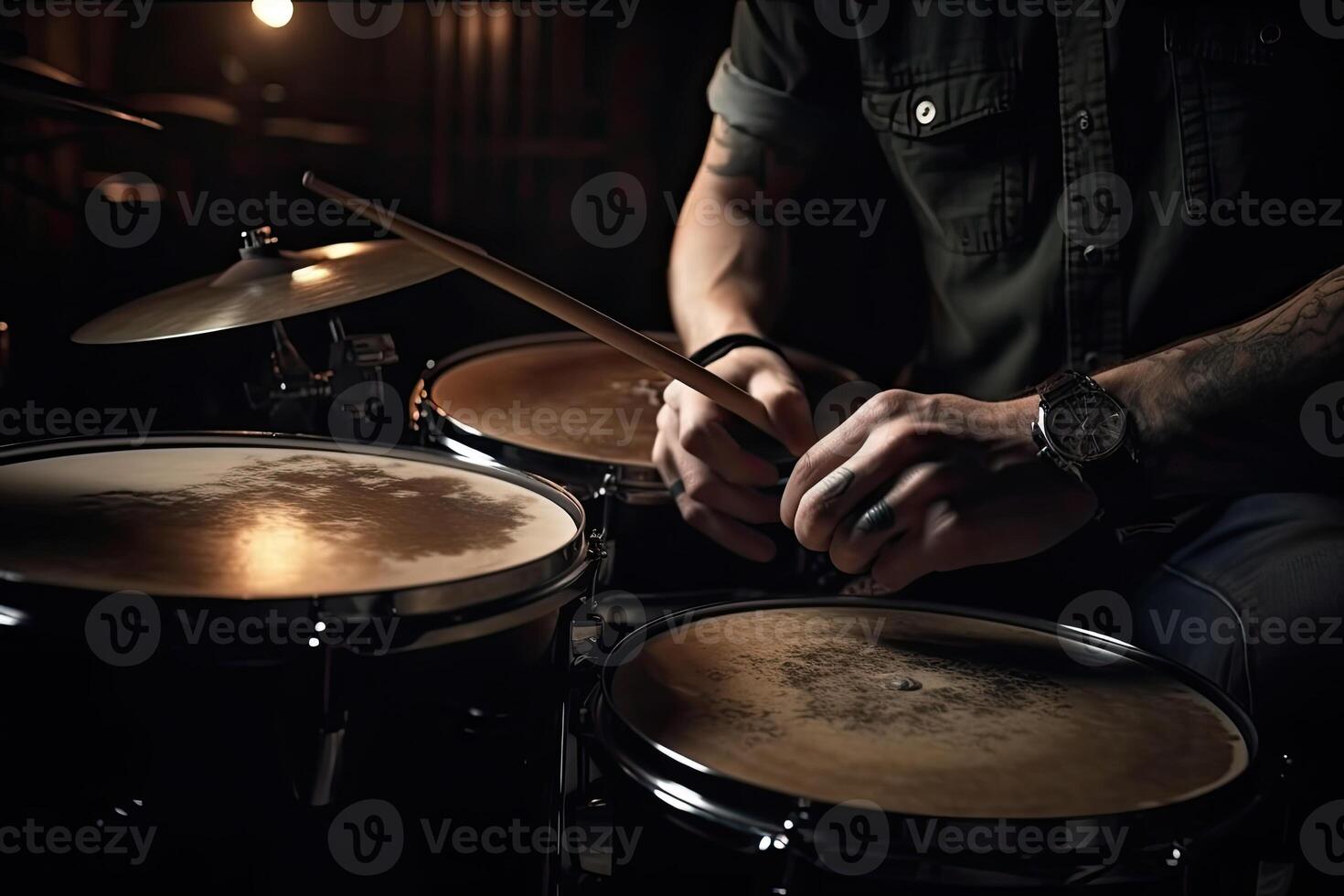 Musician plays drums, drummer on dark background. photo