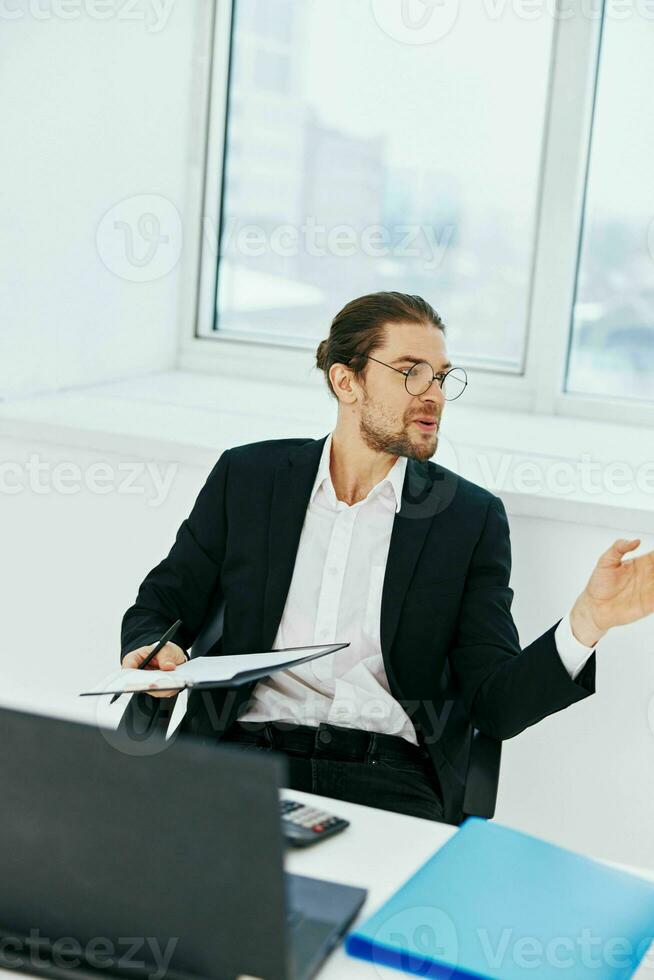 businessman phone laptop work emotions executive photo