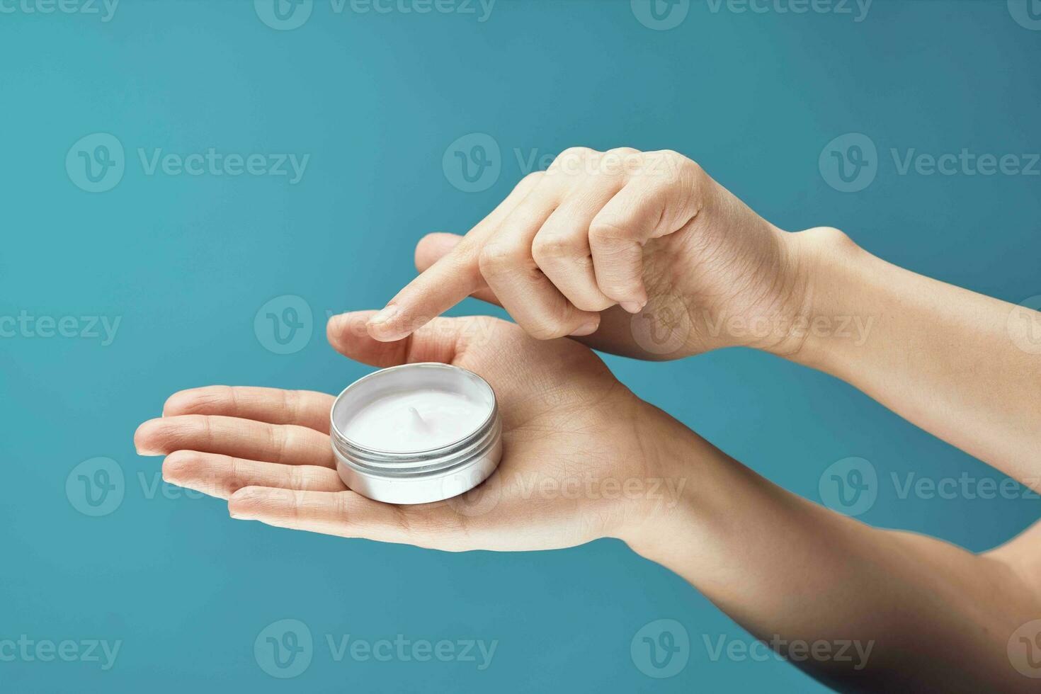 cream in hands skin care close-up dermatology health photo