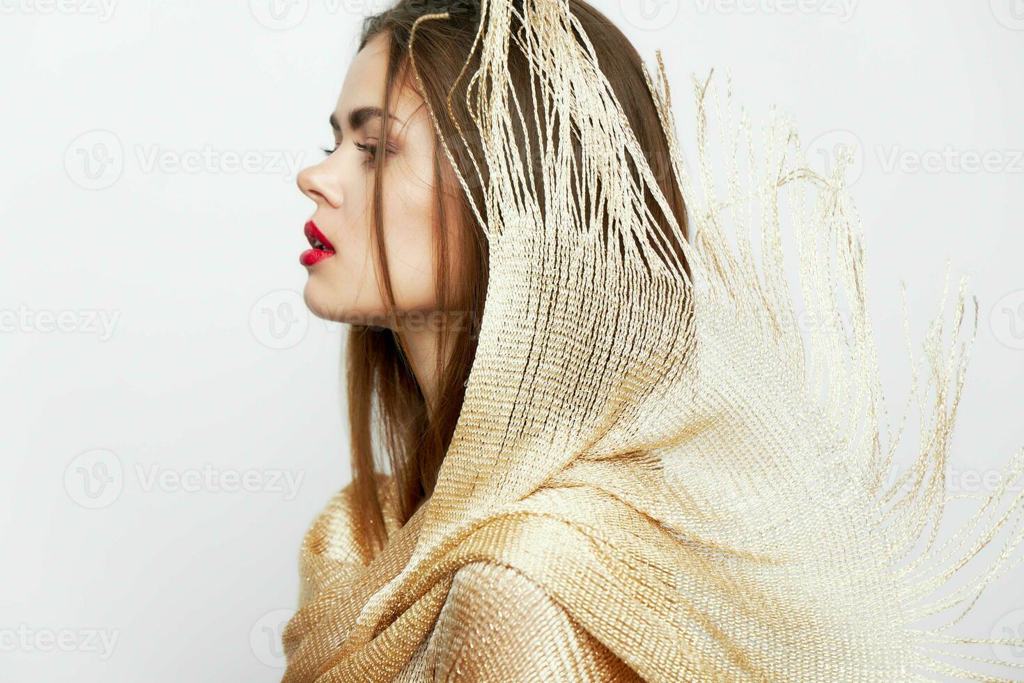 A lady with a shawl Looks aside the charm of luxury makeup photo