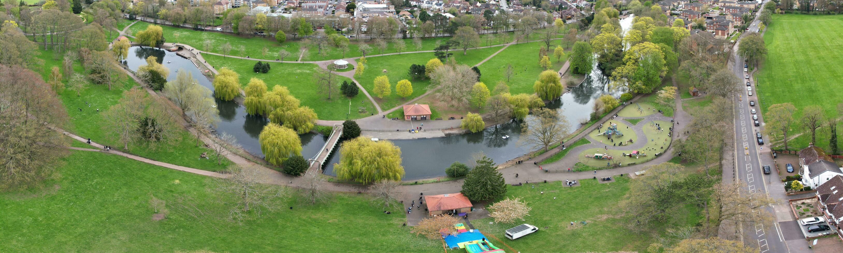 Ultra Wide Panoramic High Angle View of Luton City of England. Aerial View of Town was Captured on 17-April-2023 with Drone's Camera from Low Altitude. photo