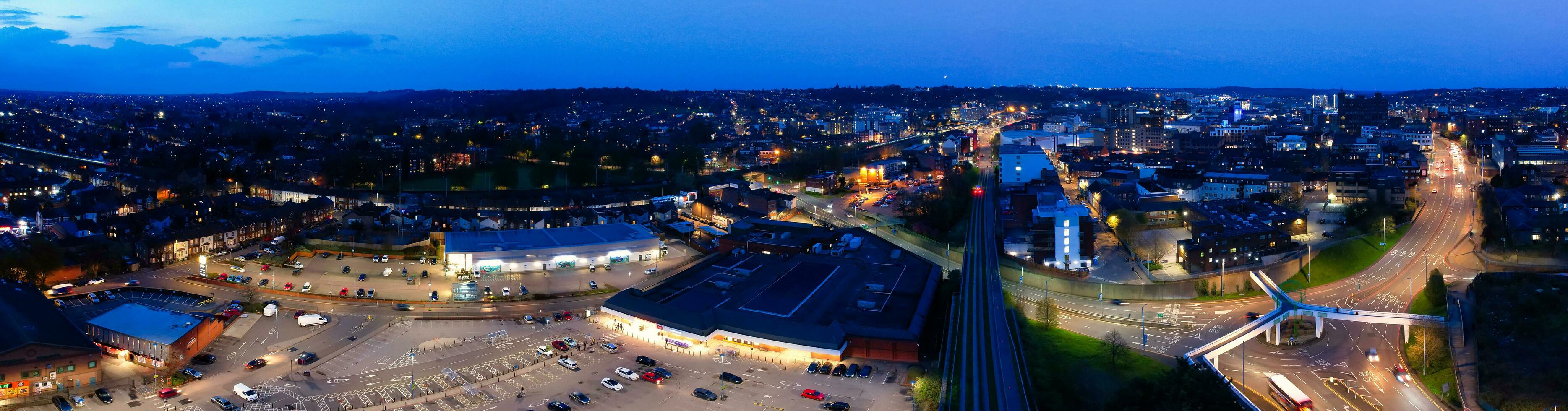 Ultra Wide Panoramic High Angle View of Luton City of England. Aerial View of Town was Captured on 17-April-2023 with Drone's Camera from Low Altitude. photo