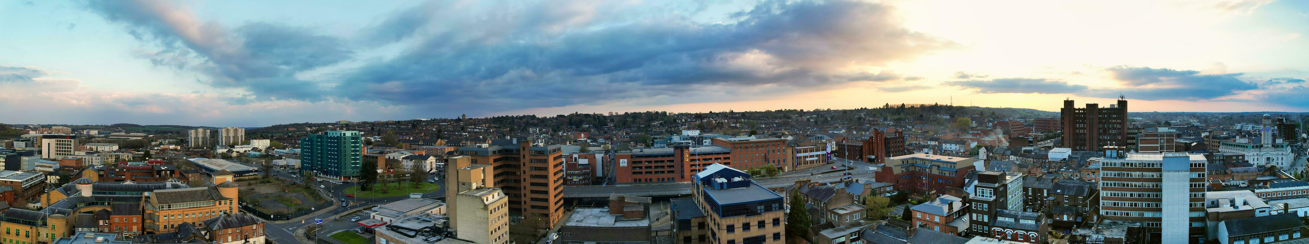 Ultra Wide Panoramic High Angle View of Luton City of England. Aerial View of Town was Captured on 17-April-2023 with Drone's Camera from Low Altitude. photo