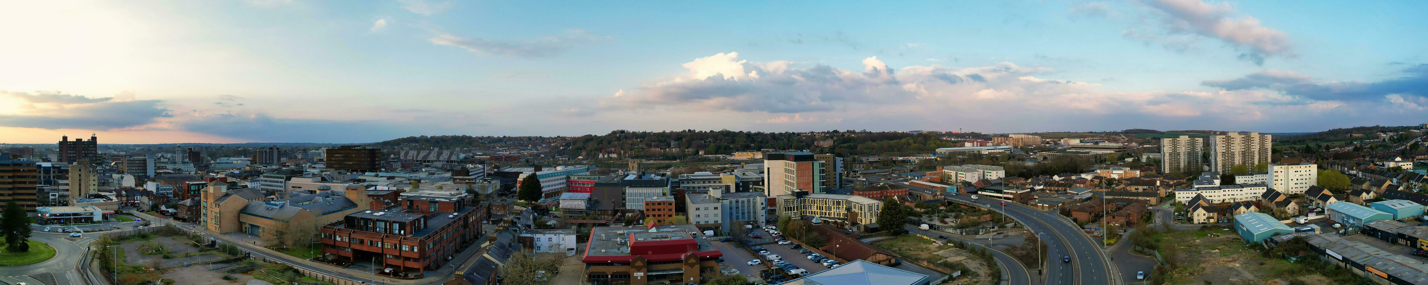 Ultra Wide Panoramic High Angle View of Luton City of England. Aerial View of Town was Captured on 17-April-2023 with Drone's Camera from Low Altitude. photo