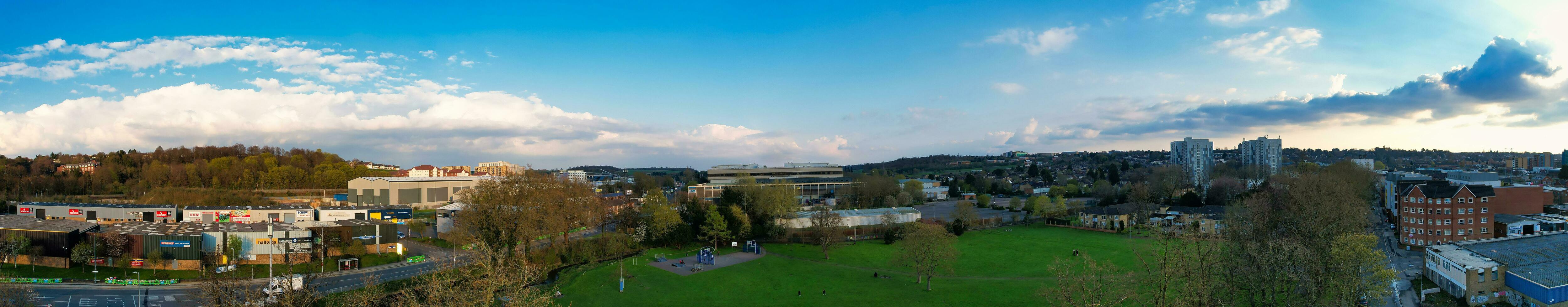 Ultra Wide Panoramic High Angle View of Luton City of England. Aerial View of Town was Captured on 17-April-2023 with Drone's Camera from Low Altitude. photo