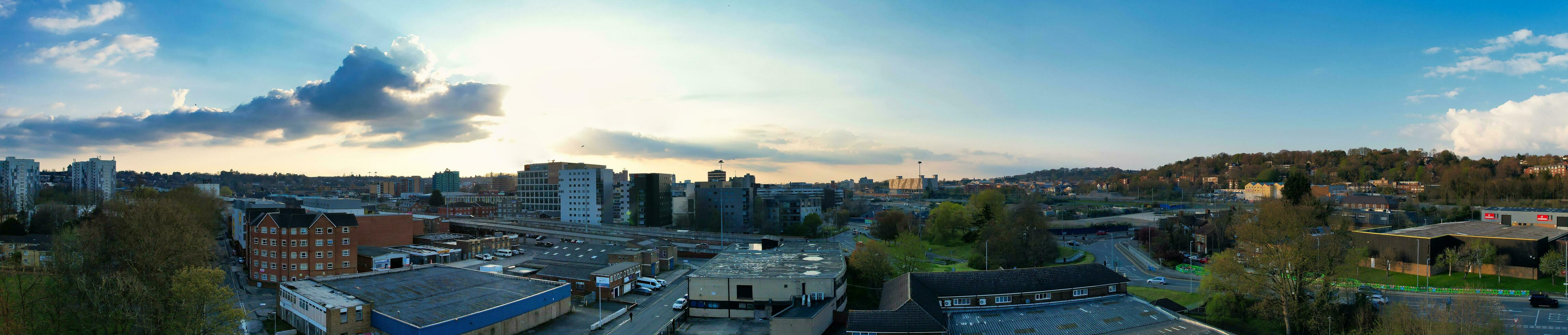 Ultra Wide Panoramic High Angle View of Luton City of England. Aerial View of Town was Captured on 17-April-2023 with Drone's Camera from Low Altitude. photo