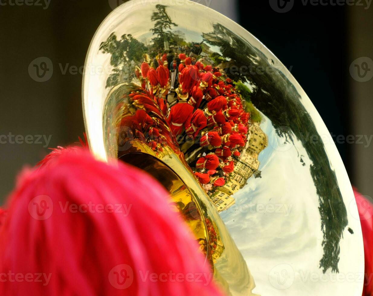 Reflections in the Tubas of Colorful Philharmonic Orchestras during the famous Easter Litany Processions photo