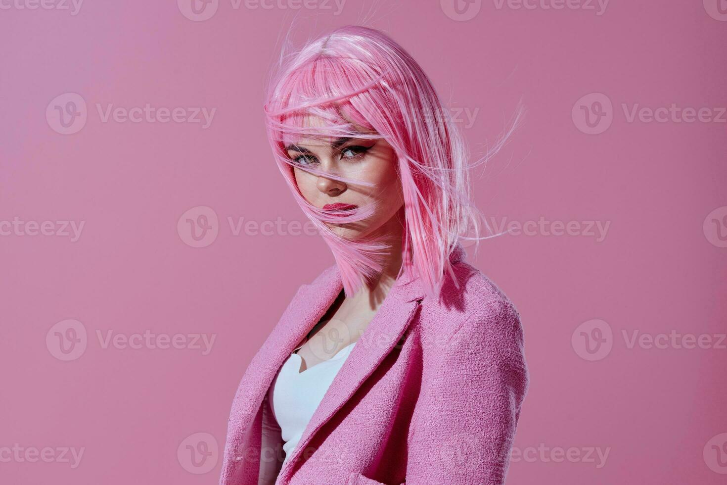 Portrait of a charming lady attractive look pink wig stylish clothes color background unaltered photo