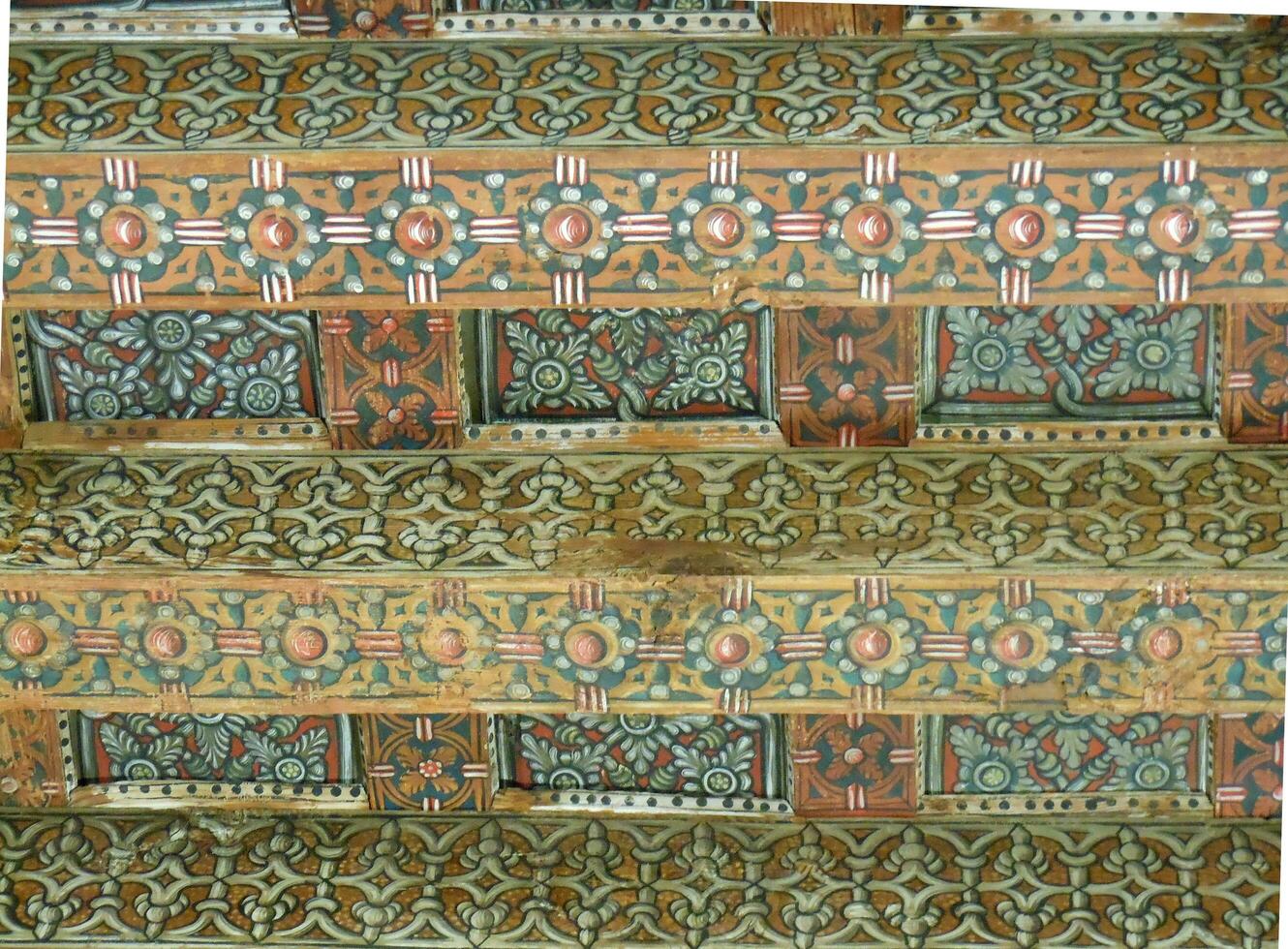 Polychrome background with geometric shapes on the ceiling of a room photo