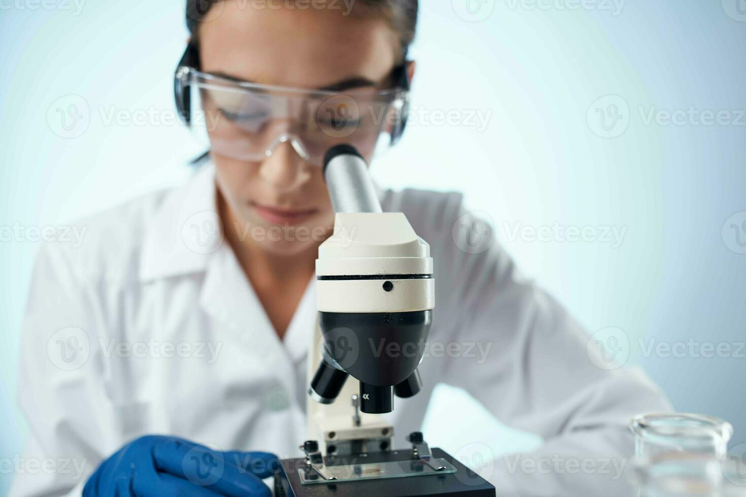 woman scientist laboratory research biotechnology diagnostics photo