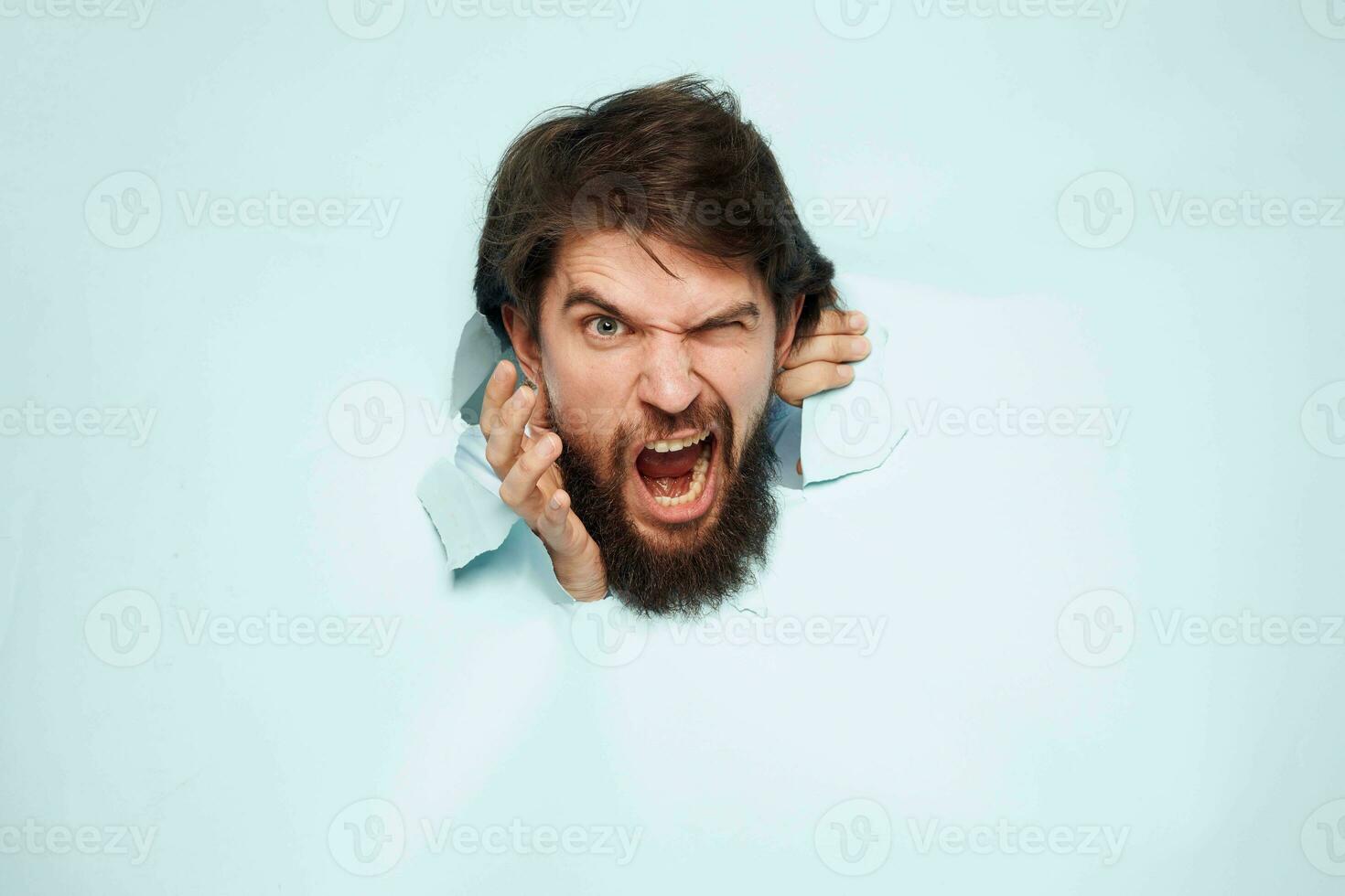 bearded man office manager work dissatisfied facial expression photo