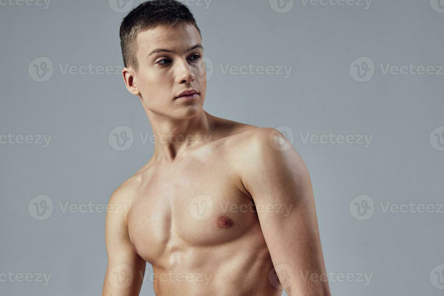man with naked body pumped up torso attractive look isolated background photo