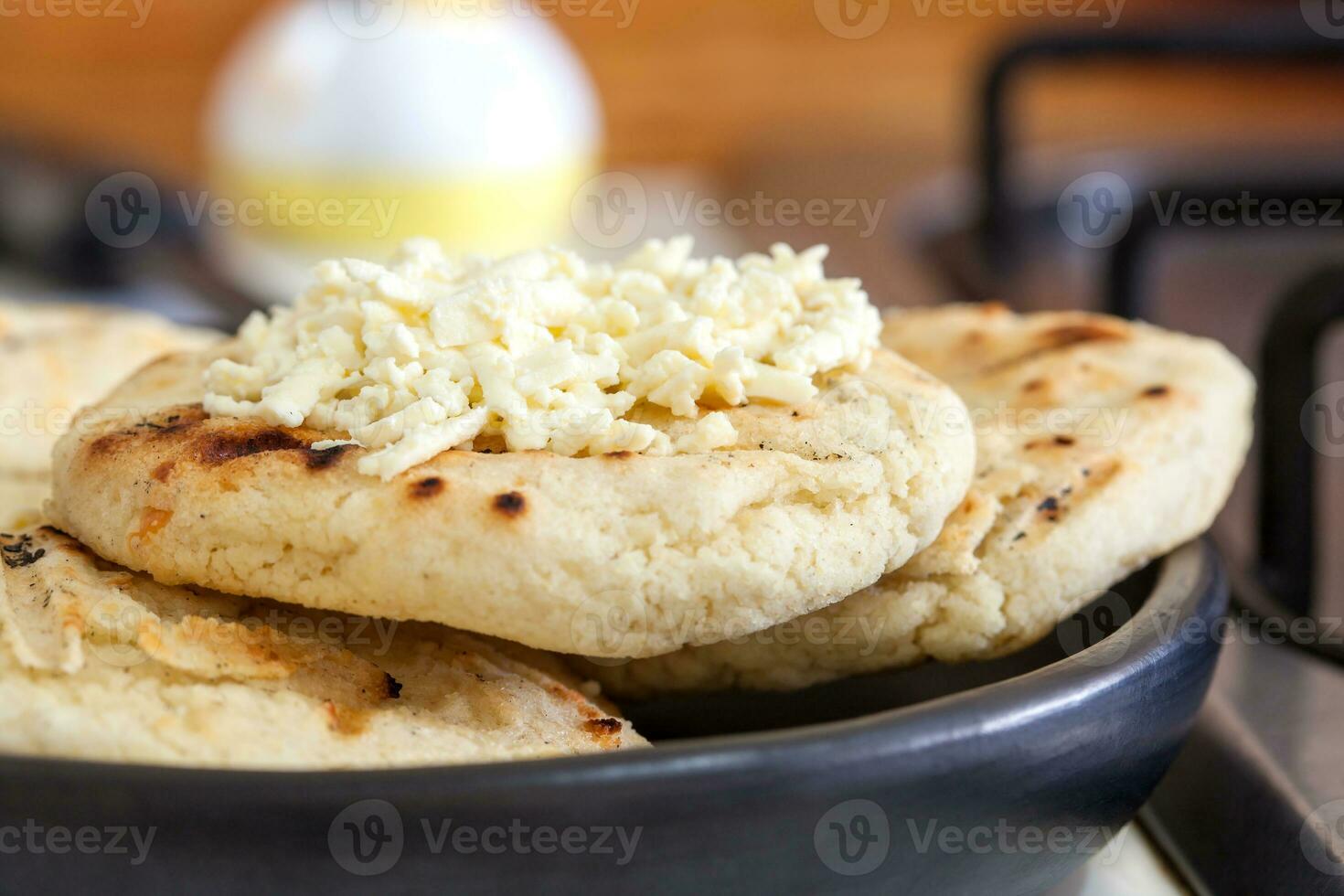 Traditional Colombian white corn arepa with cheese photo