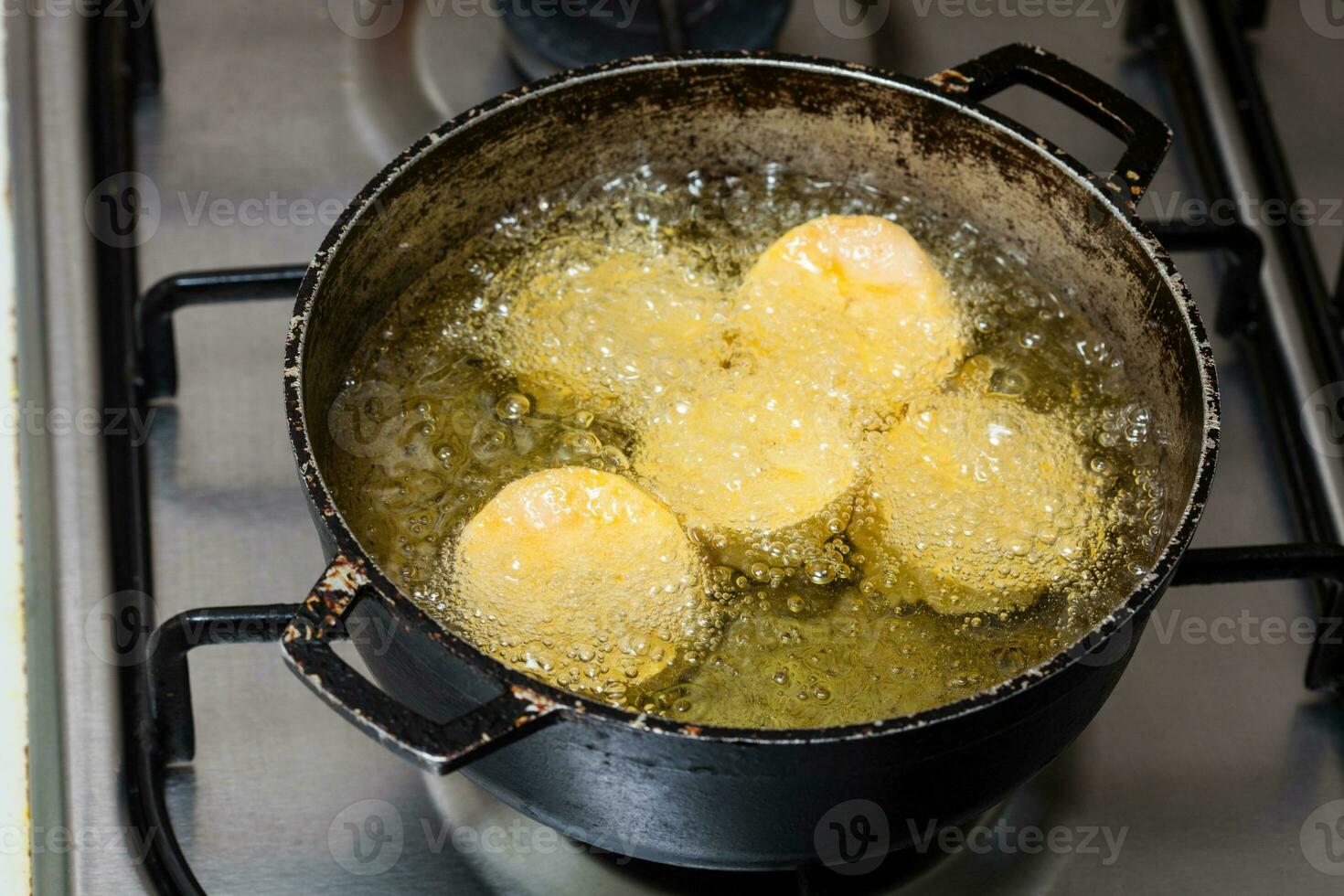 Preparation of plantain croquettes stuffed with pork cracklings photo