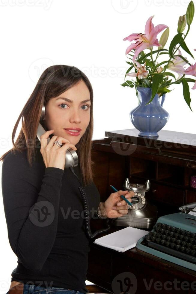 Professional woman in her thirties on white background photo